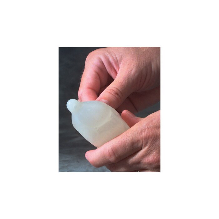 Putting condomon Economy Condom Training Model to catch UV light-sensitive fluid, health education model, Health Edco, 27006