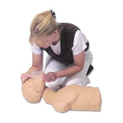 Economy Adult Sani-Manikin for CPR training, user putting face shield over manikin mouth for CPR practice, Health Edco, 56046