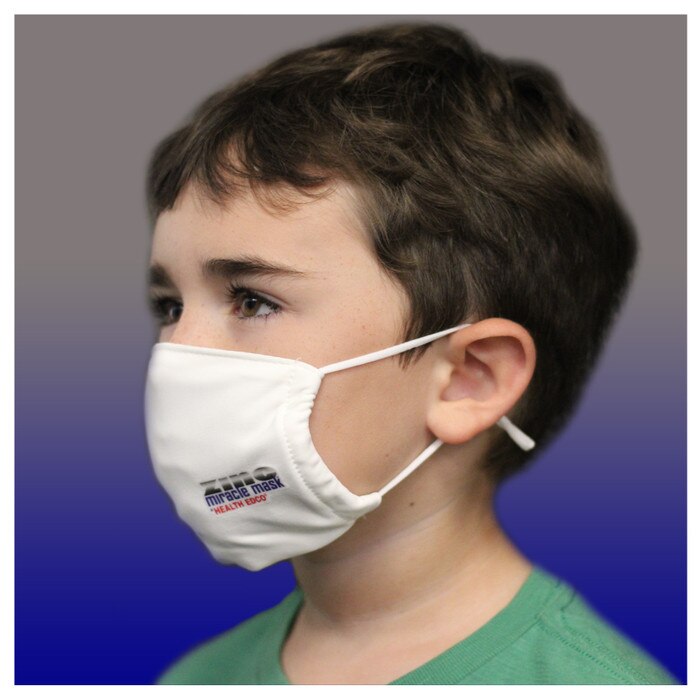 Zinc Miracle Mask by Health Edco, side view of young boy wearing youth white cloth face mask made with durable fabric 78848