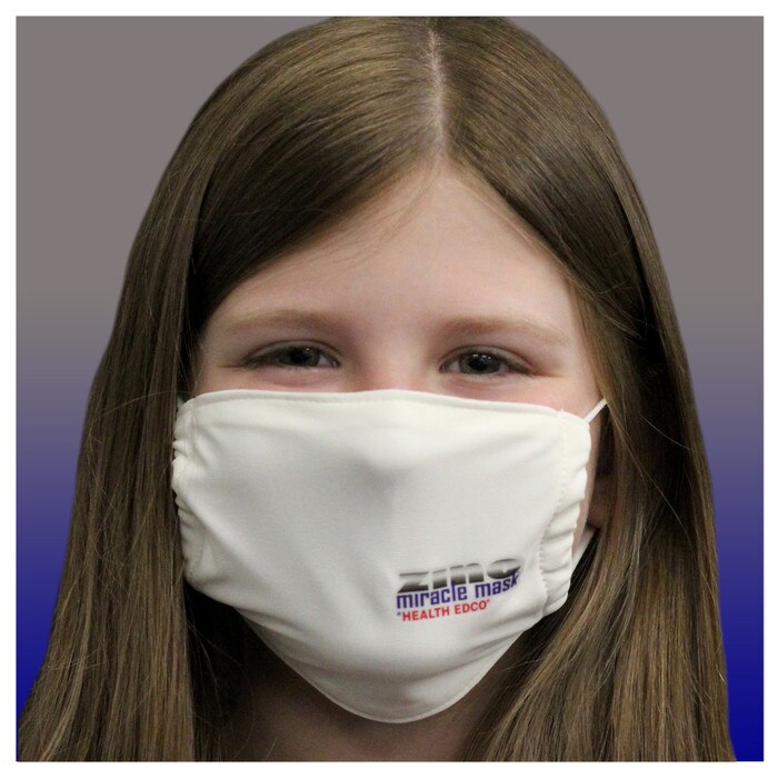 Zinc Miracle Mask by Health Edco, young girl in youth white cloth face mask made with durable, zinc-infused fabric, 78848