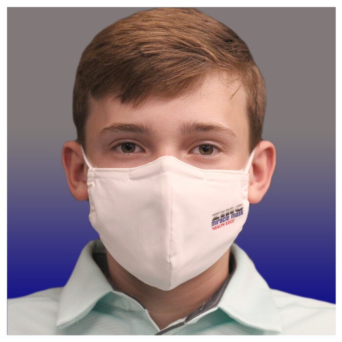 Zinc Miracle Mask by Health Edco, front view of teen boy in one-size-fits-most white cloth face mask of durable fabric, 78866