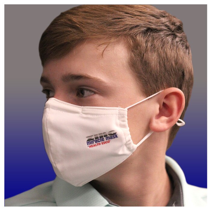 Zinc Miracle Mask by Health Edco, side view of teen boy in one-size-fits-most white cloth face mask of durable fabric, 78866