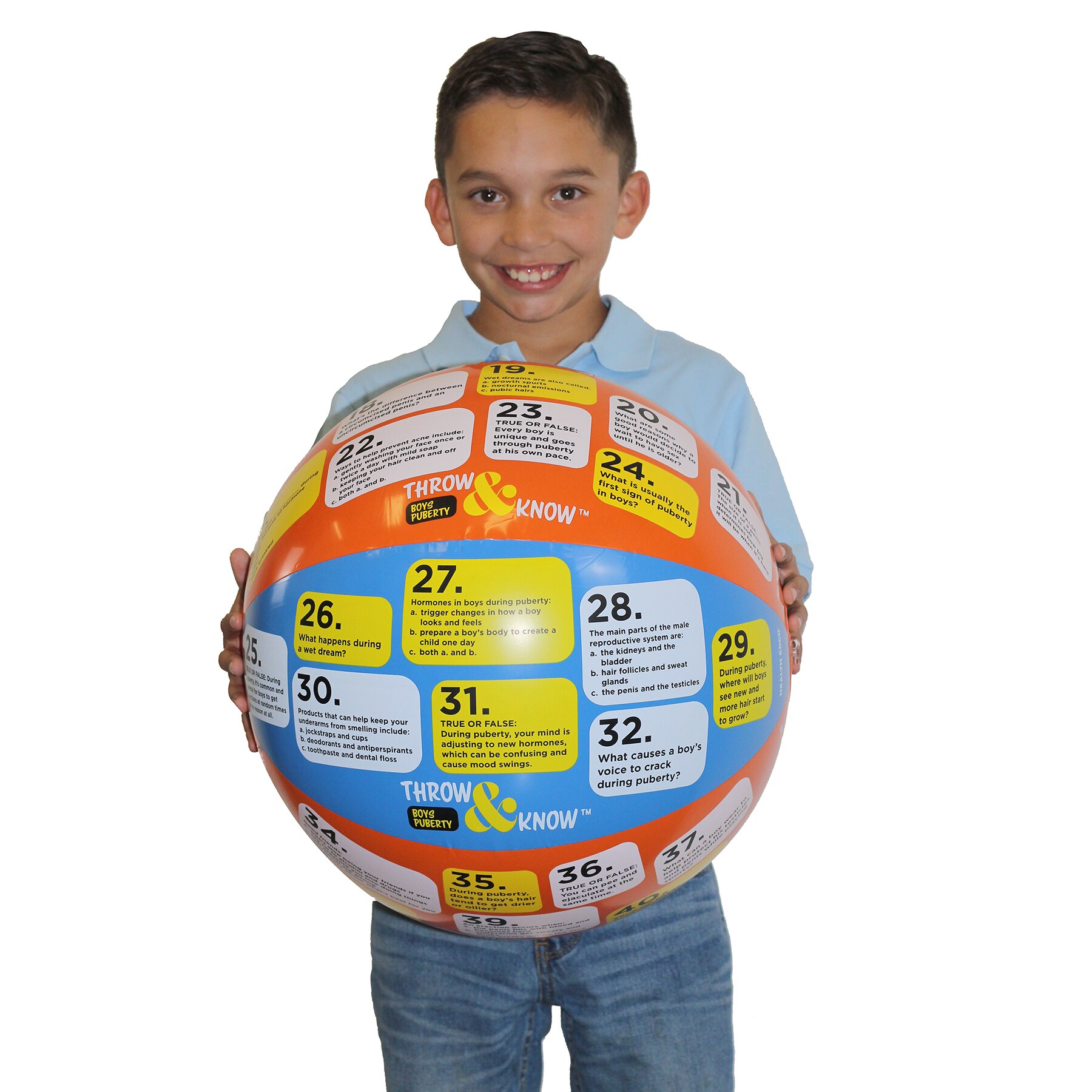 Young boy smiling and holding Health Edco’s Boys Puberty Throw & Know Activity Ball